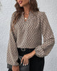 Elegante blouse met patronen