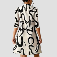 Mini Jurk met Lange Mouwen & Ronde Halslijn – Elanora