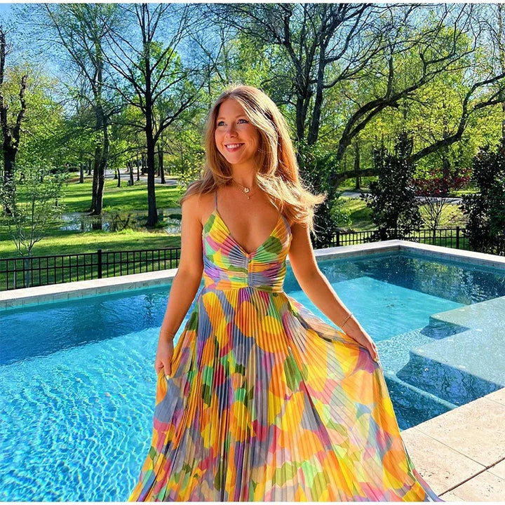 Bedrukte Zomerjurk met Diepe Hals en Strikdetail – Vivienne