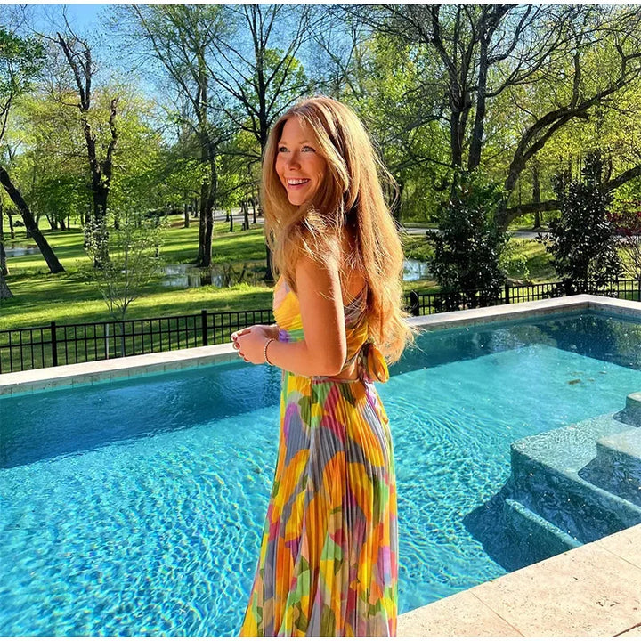 Bedrukte Zomerjurk met Diepe Hals en Strikdetail – Vivienne