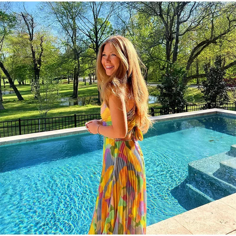 Bedrukte Zomerjurk met Diepe Hals en Strikdetail – Vivienne
