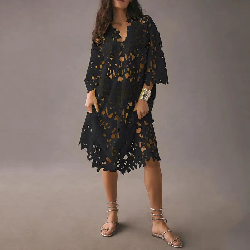Gebloemde Midi Jurk met Oogjesveter – Maelis