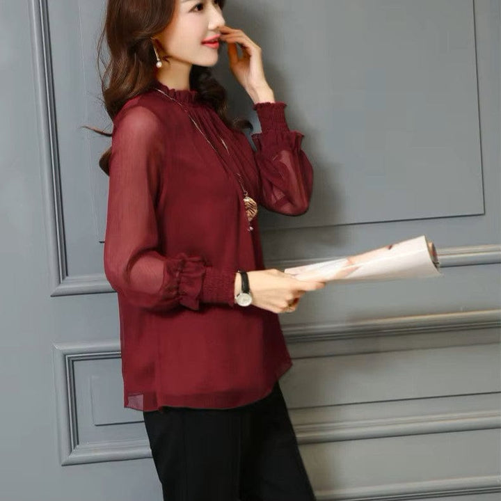 Stijlvolle dames chiffon blouse met ruches en transparante mouwen – Elina