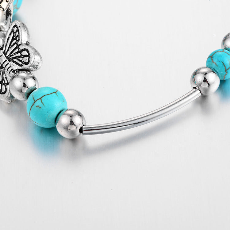 Turquoise Vlinder Kralenarmband | Met zeer gedetailleerde bedels