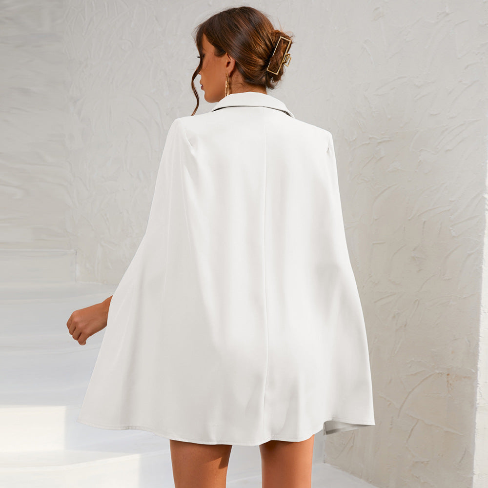 Manouk Cape Dress | Voeg een vleugje klasse en elegantie toe aan je garderobe